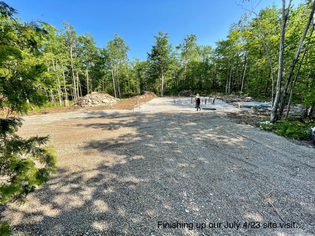 foundation poured; notice how close the south trees are to the house
