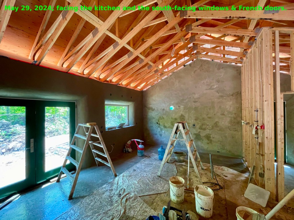 This picture shows the south window and the kitchen walls.