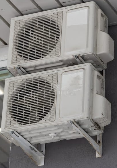 heat pump heat exchange bolted to a wall