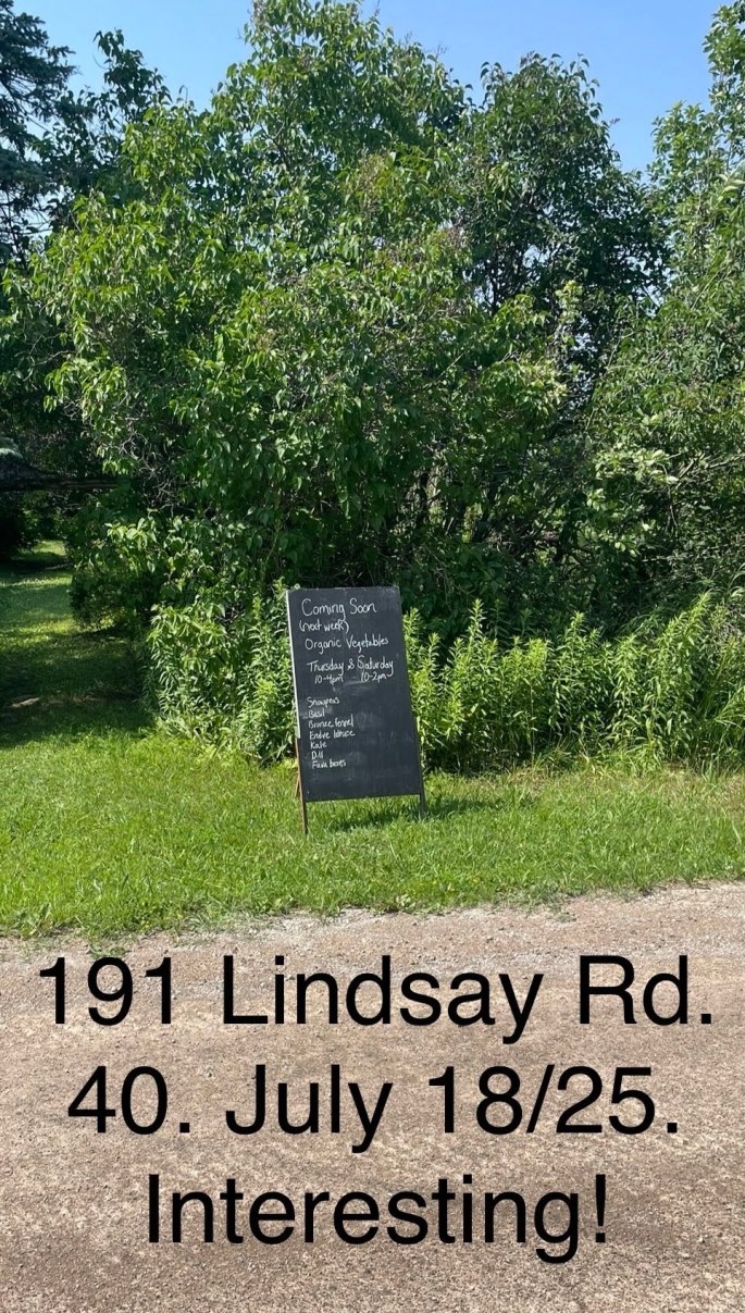 chalkboard with produce listed for sale