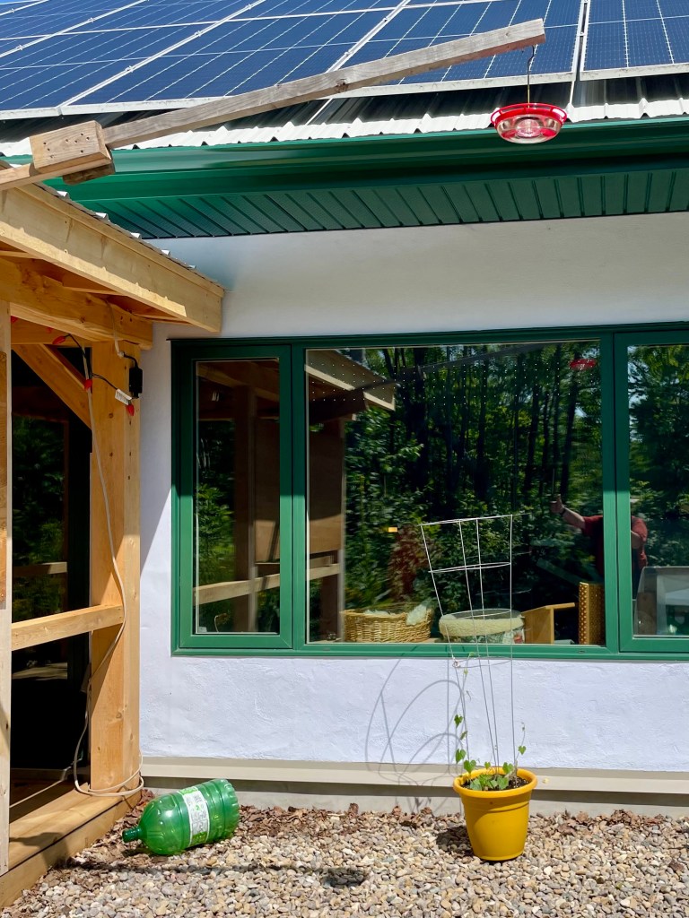 bird feeder is as high as the rain gutters