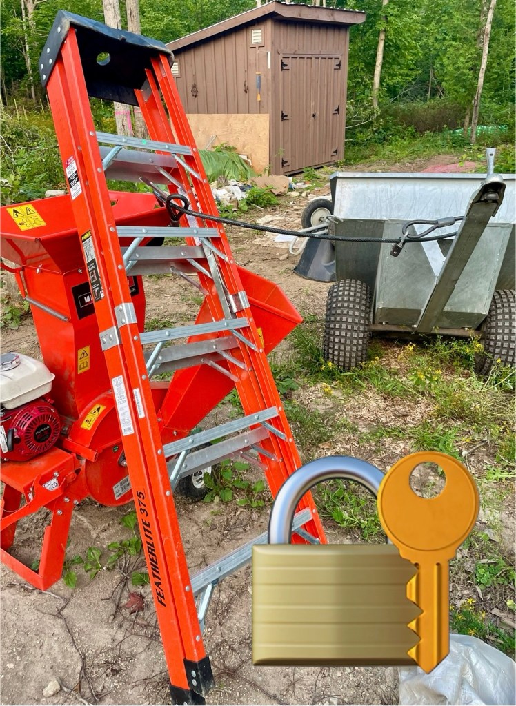 ladders, wood chipper, bush buggy locked up