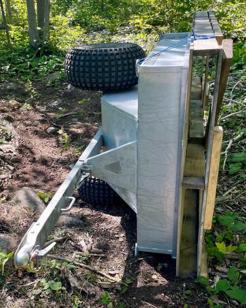 Paul tipped the bush buggy in the back yard.