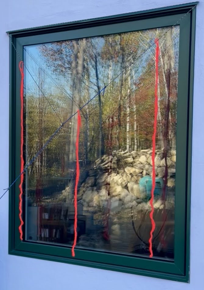 Markers on the south-east window.