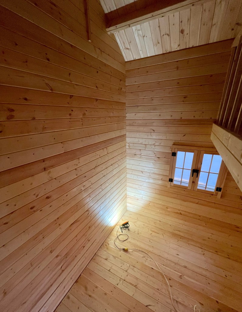 Indirect lighting inside the studio accentuates the geometry.