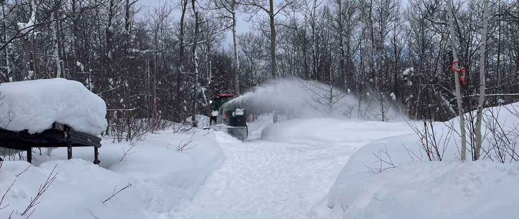 Traction issues were apparent with Brock's tractor. He kept at it!