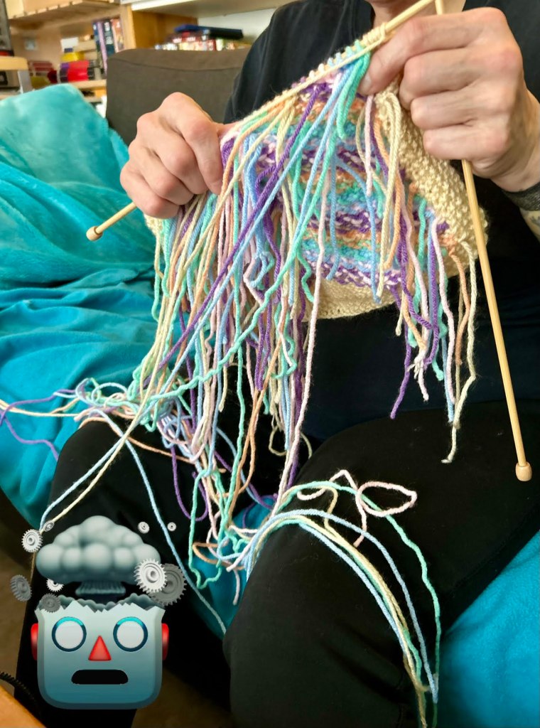 homeowner is knitting using several different colours