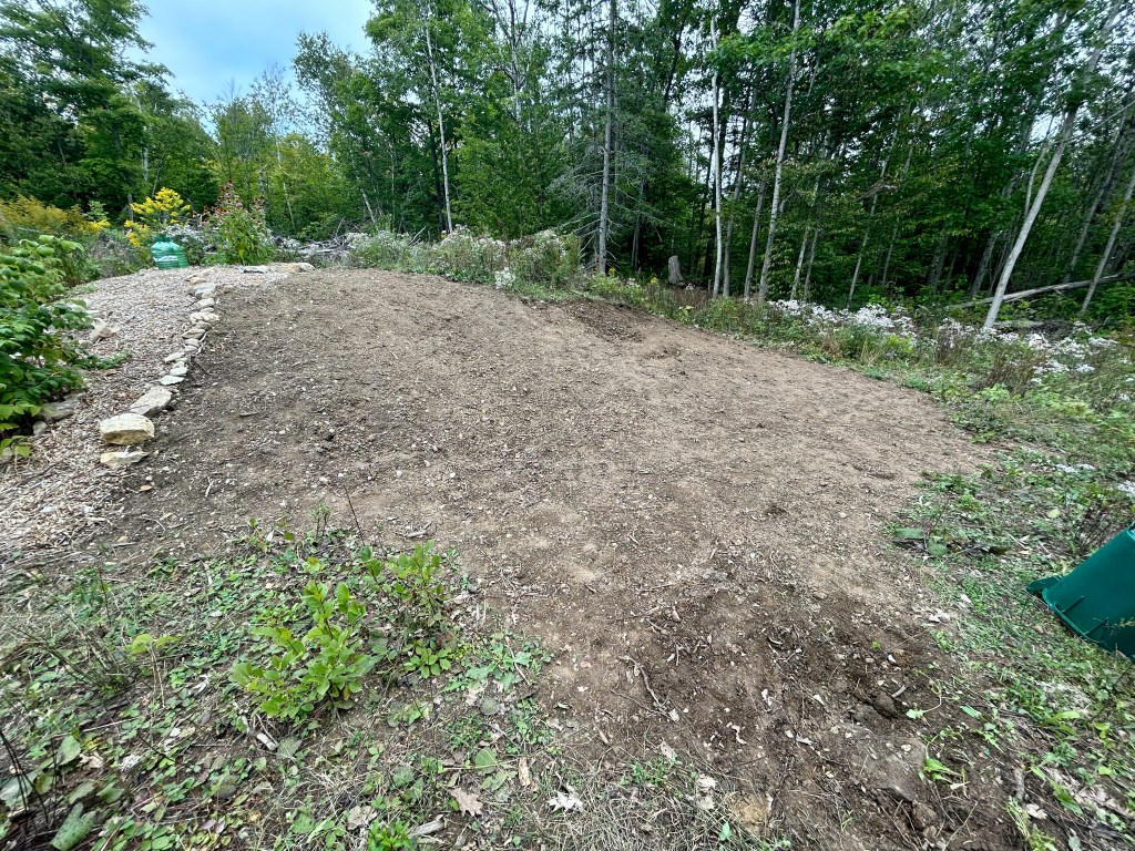 Evidence of Tobey removing offensive vegetation and boulders from the septic system.